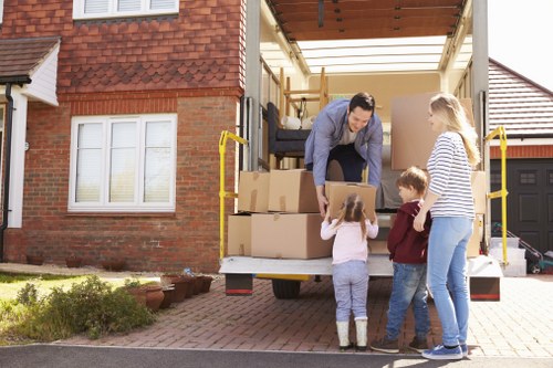 Professional movers loading a van during a Pondersend relocation