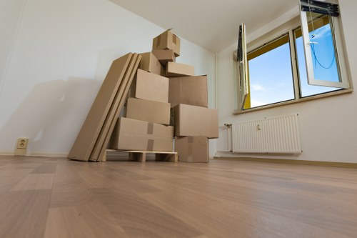 Professional movers handling flat removals in Pondersend on a stairway