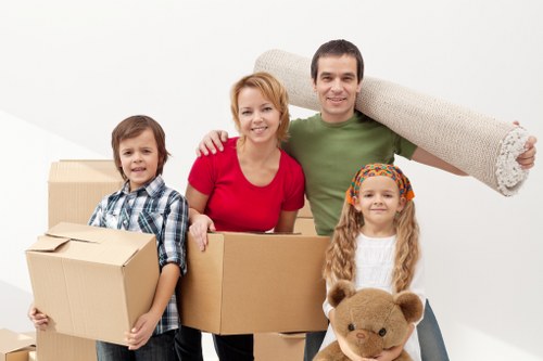Professional movers loading furniture for a Pondersend relocation